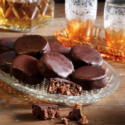 Greek walnut-filled chocolates with granola
